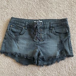 Billabong womens black jean ripped shorts with corset style lace
